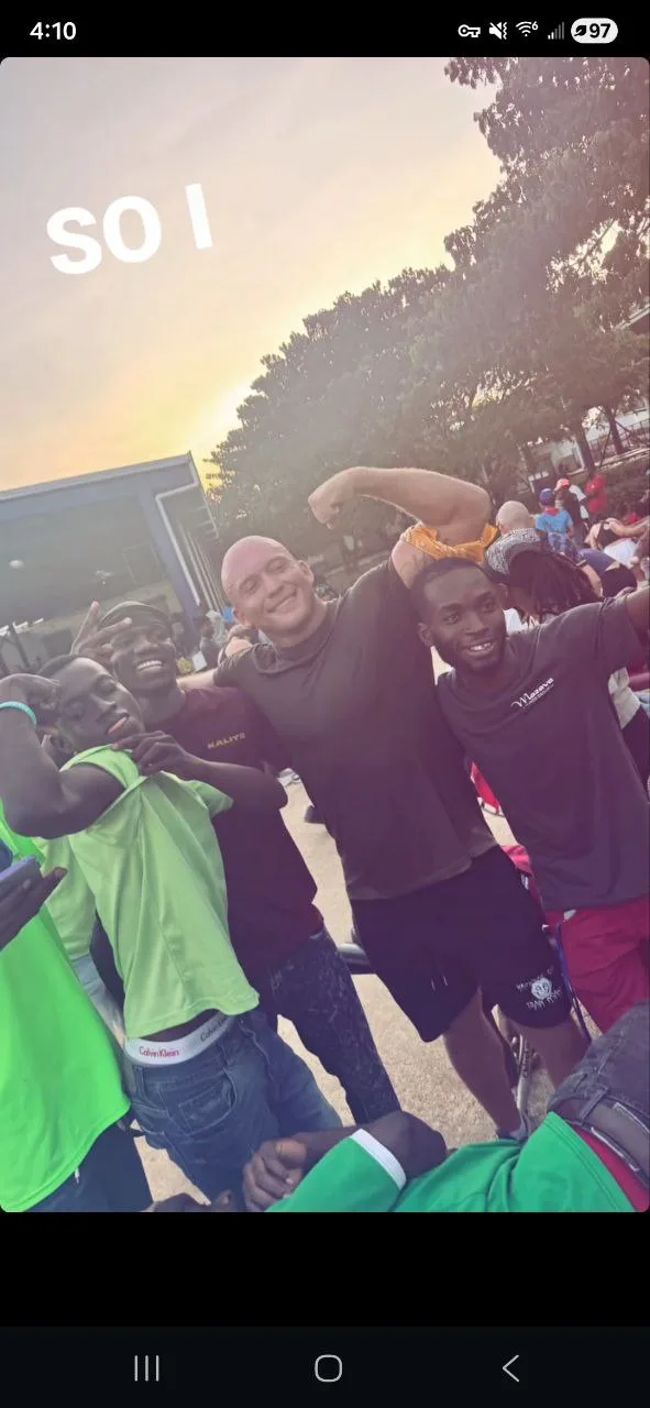 Dr. Nilsson with community members in Haiti at sunset